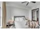 Spacious bedroom with a queen-size bed and access to walk-in closet at 5 Gadsdenboro St # 410, Charleston, SC 29401