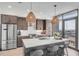 Spacious kitchen featuring stainless steel appliances and an island at 5 Gadsdenboro St # 410, Charleston, SC 29401