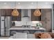 Modern kitchen with stainless steel appliances and white quartz counters at 5 Gadsdenboro St # 410, Charleston, SC 29401