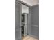 Convenient laundry room with stacked washer and dryer at 5 Gadsdenboro St # 410, Charleston, SC 29401