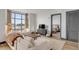 Open living room showcasing sectional sofa and view into bedroom at 5 Gadsdenboro St # 410, Charleston, SC 29401