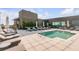 Relax by the refreshing rooftop pool with lounge chairs at 5 Gadsdenboro St # 410, Charleston, SC 29401