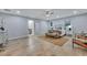 Bright bedroom featuring hardwood floors and an ensuite bathroom at 5093 Chateau Ave, North Charleston, SC 29405