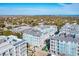 Aerial view of coastal community, resort and pools at 5804 Palmetto Dr # A-405/407, Isle of Palms, SC 29451