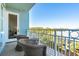 Private balcony with wicker chairs and scenic views at 5804 Palmetto Dr # A-405/407, Isle of Palms, SC 29451