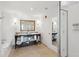 Elegant bathroom with double vanity, soaking tub, and shower at 5804 Palmetto Dr # A-405/407, Isle of Palms, SC 29451