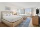 Bedroom with two double beds, a TV, and access to a balcony at 5804 Palmetto Dr # A-405/407, Isle of Palms, SC 29451