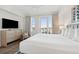 Spacious bedroom with balcony access and a king-size bed at 5804 Palmetto Dr # A-405/407, Isle of Palms, SC 29451
