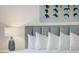 Bright bedroom with comfortable beds and stylish decor at 5804 Palmetto Dr # A-405/407, Isle of Palms, SC 29451