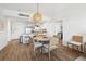 Open concept dining area with kitchen and living room access at 5804 Palmetto Dr # A-405/407, Isle of Palms, SC 29451