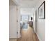 Bright hallway with hardwood floors leading to bedrooms at 5804 Palmetto Dr # A-405/407, Isle of Palms, SC 29451