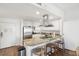 Open concept kitchen with island, stainless steel appliances, and granite countertops at 5804 Palmetto Dr # A-405/407, Isle of Palms, SC 29451