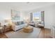 Relaxing living room with a sofa and two armchairs at 5804 Palmetto Dr # A-405/407, Isle of Palms, SC 29451