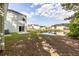 Backyard with pond view and partial house view at 7468 Northgate Dr, Hanahan, SC 29410