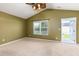 Bedroom with private balcony access and carpet flooring at 7468 Northgate Dr, Hanahan, SC 29410