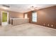 Upstairs bedroom with window and ceiling fan at 7468 Northgate Dr, Hanahan, SC 29410