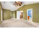 Spacious bedroom with carpet flooring and ceiling fan at 7468 Northgate Dr, Hanahan, SC 29410