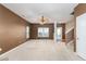 Living room with carpet, ceiling fan, and access to back yard at 7468 Northgate Dr, Hanahan, SC 29410