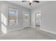 Bedroom with carpet, private door to bathroom, and window at 760 Myrtle Branch St, Summerville, SC 29486