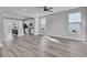Spacious living room with hardwood floors and kitchen view at 760 Myrtle Branch St, Summerville, SC 29486