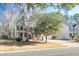 Two story house with a large front yard and driveway at 9504 Markley Blvd, Summerville, SC 29485