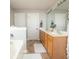 Modern bathroom with double vanity and a bathtub at 9504 Markley Blvd, Summerville, SC 29485