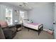 Charming bedroom with twin bed, carpet, and window at 9504 Markley Blvd, Summerville, SC 29485