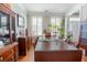 Spacious dining room featuring a large table and built-in hutch at 9504 Markley Blvd, Summerville, SC 29485