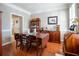 Formal dining room with hardwood floors and antique furniture at 9504 Markley Blvd, Summerville, SC 29485