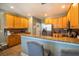 Well-equipped kitchen featuring granite countertops and ample wood cabinets at 9504 Markley Blvd, Summerville, SC 29485