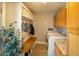 Convenient laundry room with built-in storage and washer/dryer at 9504 Markley Blvd, Summerville, SC 29485