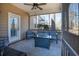 Relaxing screened porch with seating and fire pit at 9504 Markley Blvd, Summerville, SC 29485