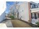 Side yard with a concrete driveway at 9504 Markley Blvd, Summerville, SC 29485