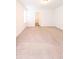 Spacious bedroom with neutral carpeting and door to hallway at 9806 Sickle Dr, Ladson, SC 29456