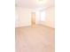 Bright bedroom featuring neutral carpeting and a large closet at 9806 Sickle Dr, Ladson, SC 29456