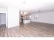 Open concept dining area with hardwood floors and chandelier at 9806 Sickle Dr, Ladson, SC 29456