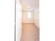 Spacious walk-in closet with double hanging rods and neutral carpeting at 9806 Sickle Dr, Ladson, SC 29456