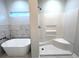 Bathroom with soaking tub and walk-in shower at 100 Del Ray Dr, Walterboro, SC 29488