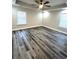 Spacious bedroom with ceiling fan and grey vinyl plank flooring at 101 Brien, Walterboro, SC 29488