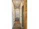 Clean hallway with grey vinyl plank flooring and white doors at 101 Brien, Walterboro, SC 29488