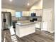 Modern kitchen featuring white shaker cabinets, granite countertops, and stainless steel appliances at 101 Brien, Walterboro, SC 29488