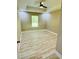 A bright bedroom features a ceiling fan, recessed lighting, and light hardwood floors at 1034 Weeks Lane, Round O, SC 29474