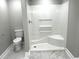 Modern bathroom featuring a walk-in shower and toilet at 104 Del Ray Dr, Walterboro, SC 29488