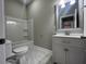 Clean bathroom with a white vanity and marble-tiled floor at 104 Del Ray Dr, Walterboro, SC 29488