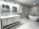 Spa-like bathroom with soaking tub and double vanity at 104 Del Ray Dr, Walterboro, SC 29488