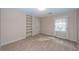 Bright bedroom featuring built-in shelving and carpet at 108 Fairway Dr, Summerville, SC 29483