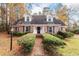 Brick ranch house with a landscaped yard and walkway at 108 Fairway Dr, Summerville, SC 29483