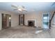 Living room with brick fireplace and ceiling fan at 108 Fairway Dr, Summerville, SC 29483
