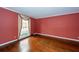 Spacious living room with hardwood floors and red walls at 108 Fairway Dr, Summerville, SC 29483