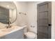Modern bathroom with white vanity and hexagon tile at 1111 Barrett Rd, Charleston, SC 29407